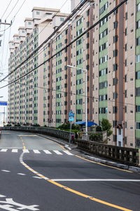 Empty highway by residential building