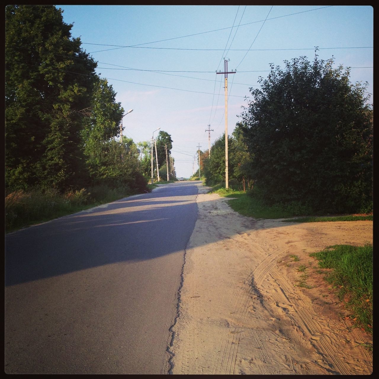 the way forward, transportation, diminishing perspective, road, tree, vanishing point, transfer print, electricity pylon, power line, road marking, clear sky, country road, sky, auto post production filter, empty, long, empty road, asphalt, street, day