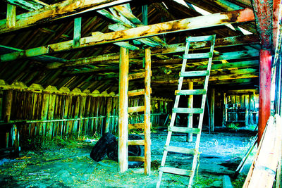 Wooden ladders in old room