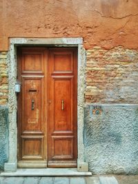 Closed wooden door of building
