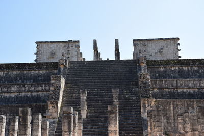 Low angle view of old building against clear sky