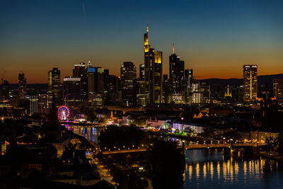 Skyline frankfurt with mainfest at the river with carusels and giant wheel