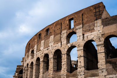 Low angle view of the coliseum against sky in rome 