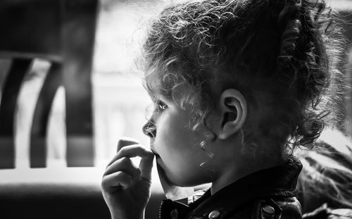 Close-up of boy looking away