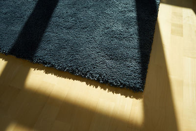 High angle view of rug on floor