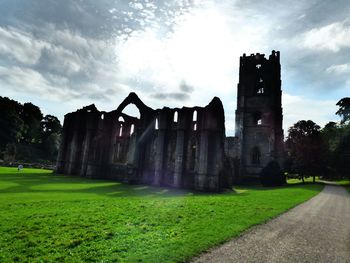 Old ruins against cloudy sky