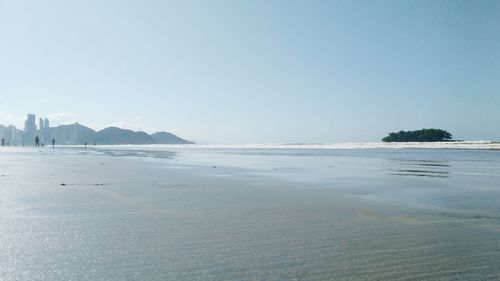 View of beach against clear sky