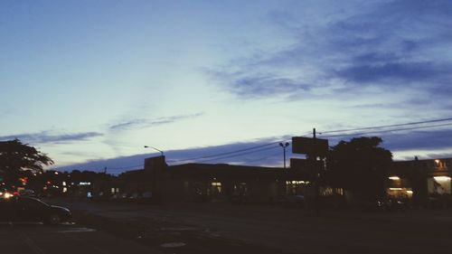 Road with buildings in background