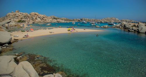 Panoramic view of people on beach