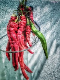 High angle view of red chili peppers on table