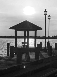 Built structure on beach against sky