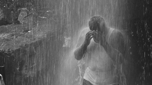 Reflection of woman in water