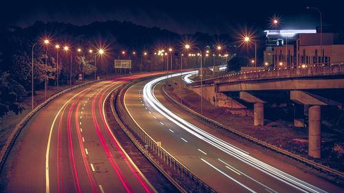 High angle view of light trails on street at night