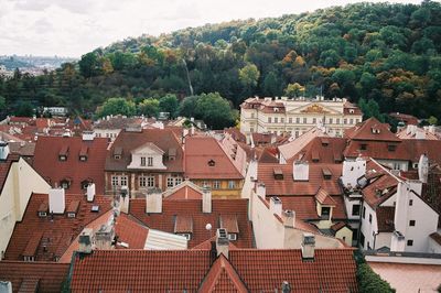 Houses in city against sky