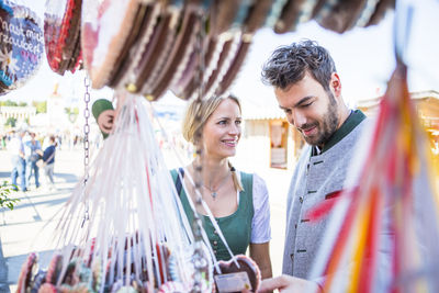 Friends standing at market