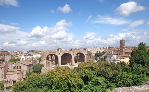 Panoramic view of old building in city against sky