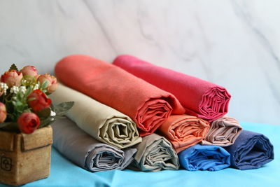 Close-up of multi colored roses on table