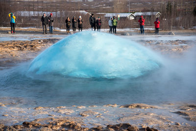 People standing geyser