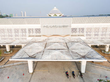 People in front of building