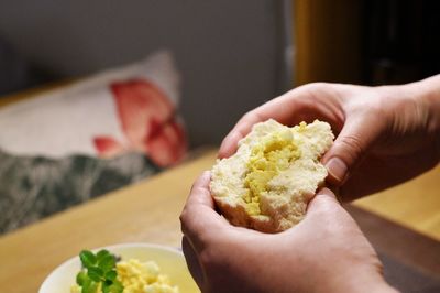 Close-up of man eating food