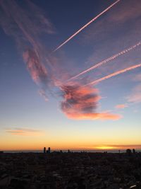 Scenic view of sunset over cityscape