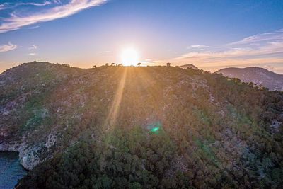 Scenic view of mountains against sky during sunset