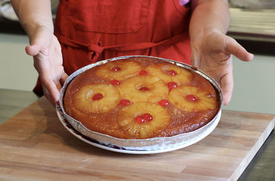 Midsection of woman holding food