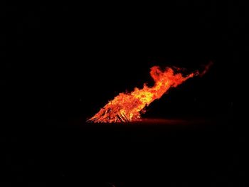 Low angle view of bonfire at night