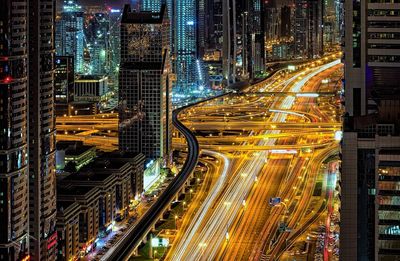 High angle view of light trails on city street