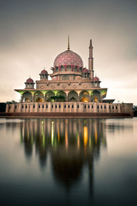 Reflection of building in lake