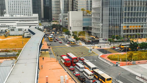 High angle view of traffic on road by buildings