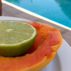 Close-up of lemon in plate