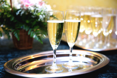 Close-up of champagne flute on table