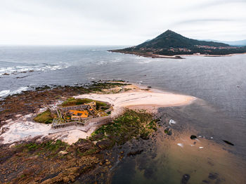 Aerial drone view over historic portuguese fortress in the atlantic ocean on the border of spain.