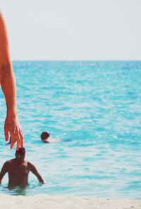 People enjoying at beach