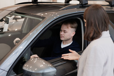 Portrait of woman driving car