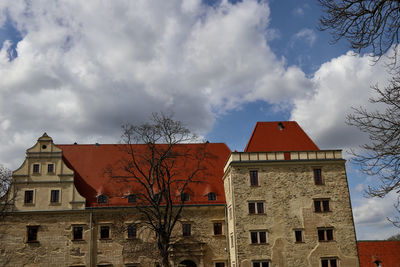 Low angle view of buildings against sky