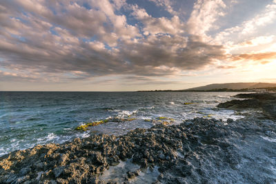 Scenic view of sea against sky during sunset