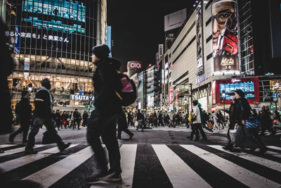 People walking on city street