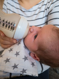 Close-up of baby holding hand