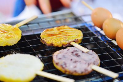 Close-up of meat on barbecue grill