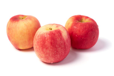 Close-up of apple against white background