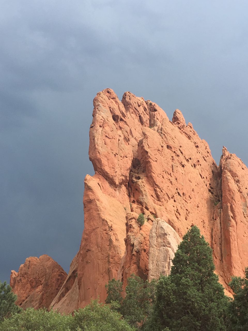 rock - object, rock formation, tranquil scene, geology, scenics, beauty in nature, sky, cliff, nature, tranquility, mountain, day, non-urban scene, physical geography, outdoors, rocky, remote, arid climate, extreme terrain, eroded, no people, rocky mountains, solitude, countryside, mountain range, cloud - sky