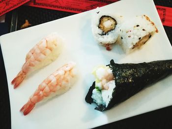 Close-up of sushi served on table