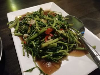 High angle view of chopped vegetables in plate