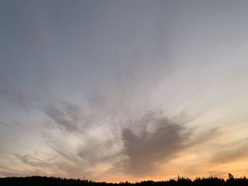 Low angle view of dramatic sky during sunset