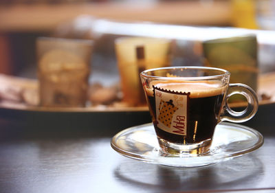 Close-up of coffee cup on table