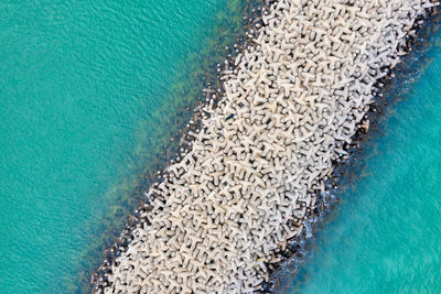 High angle view of surf on beach