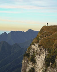 Scenic view of mountains against sky during sunset