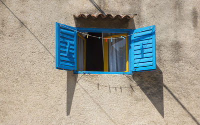 High angle view of blue lantern on beach